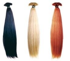 Haar Extensions in schwarz, blond und rot in Wien